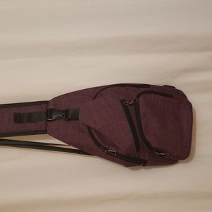 Cross body purse with connected USB cord